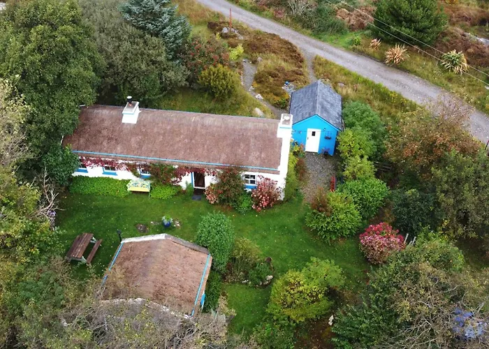 The Rockhouse - Cosy Stone Built Thatch Vakantiehuis *